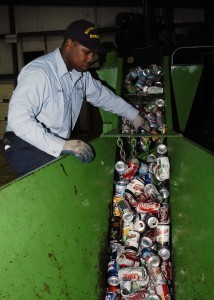 Fireman Brian Wilson of Charleston, S.C., separates bottles from aluminum cans